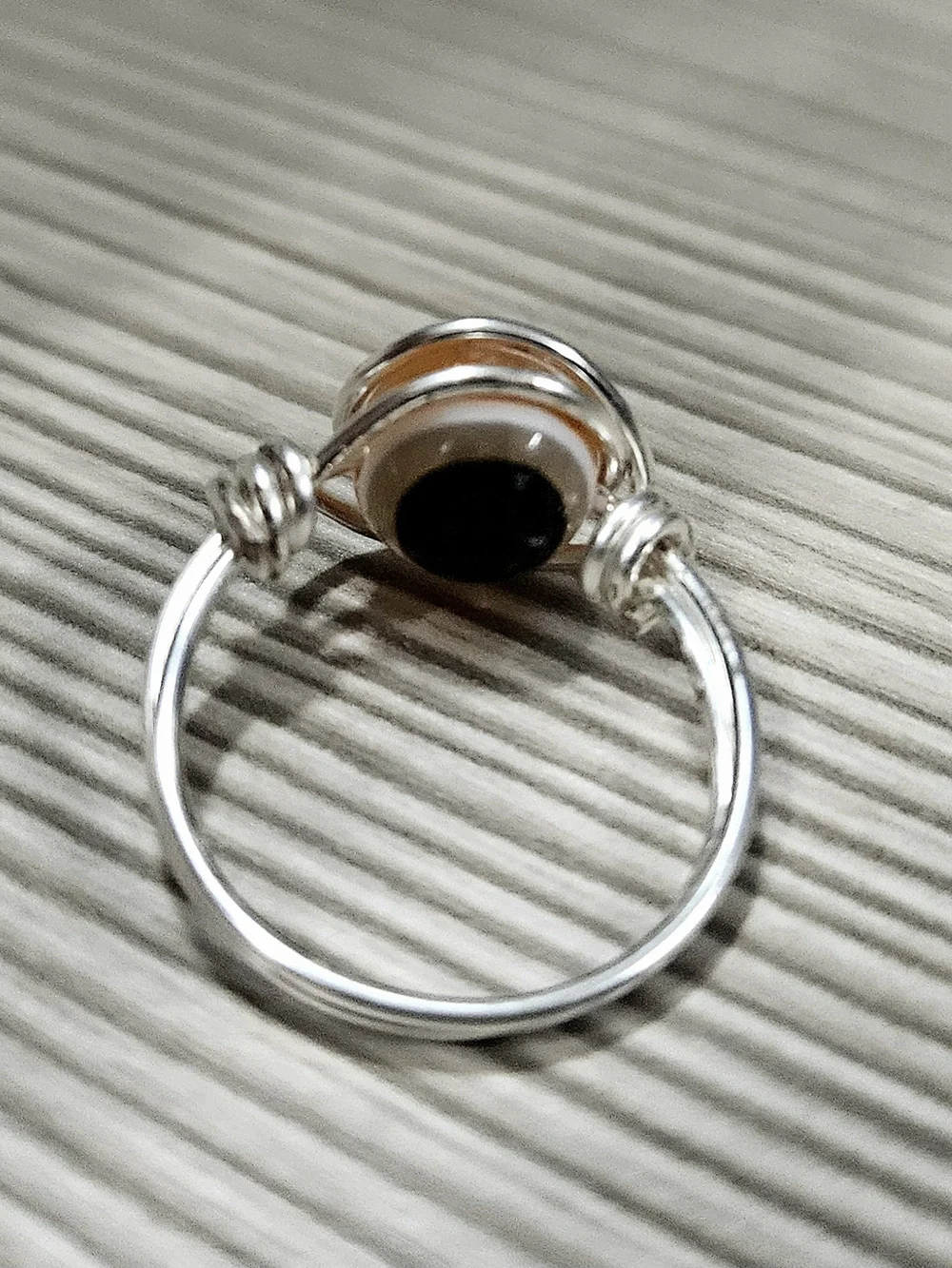 Silver Wire Evil Eye Ring with Orange and Black Glass Accent